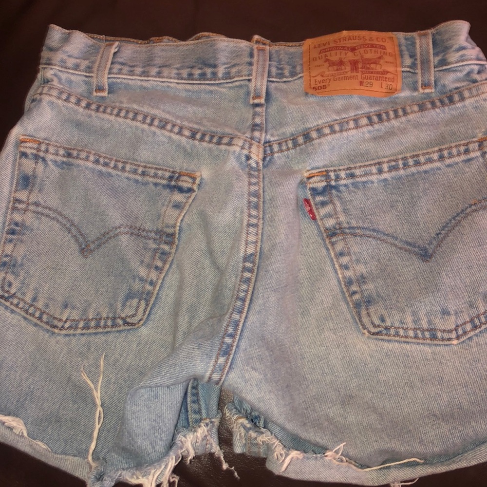 Levi Strauss distressed jean shorts.